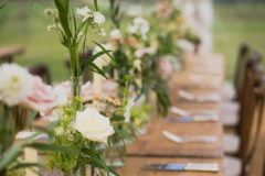 B&J wedding table flowers and candles