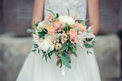Bridal bouquet with apricot roses, dahlia, foliage