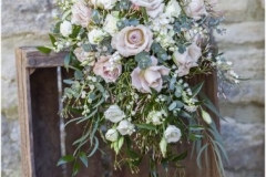 Bride's bouquet - vintage roses, lily of the valley, foliage