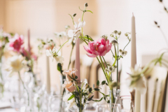 Spring flower stem vases & candles at Grittleton House