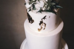 Wedding cake with white gold hydrangea foliage