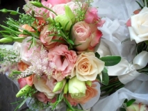 Bride's bouquet - pink and apricot roses, astilbe & herbs.